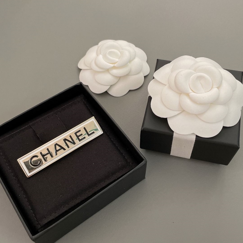 Ch*el brooches